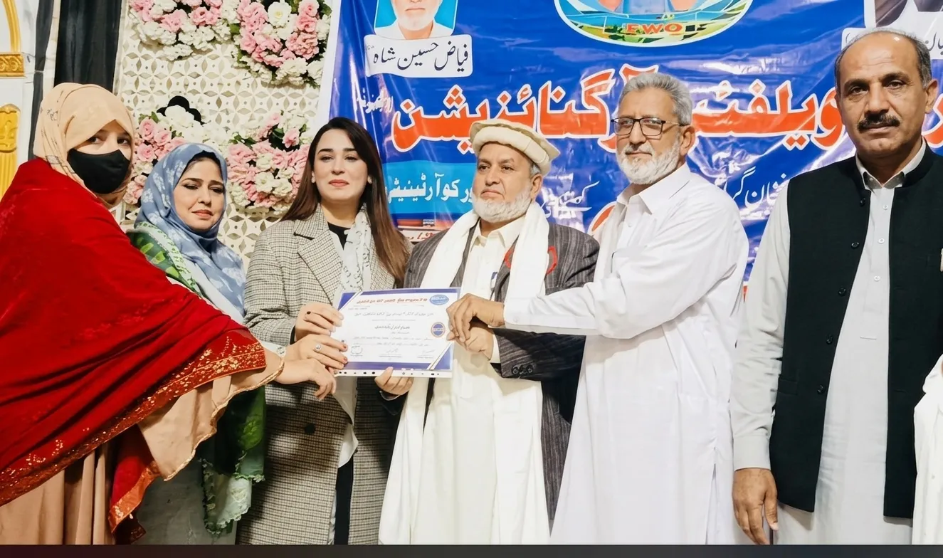 Group presentation of an official appreciation certificate during the 2nd Ambulance Inauguration Ceremony in Lahore hosted by Tanawal Welfare Organization.